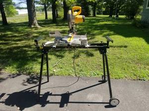 lot 27 image: DeWalt Compound Miter Saw Model DW703