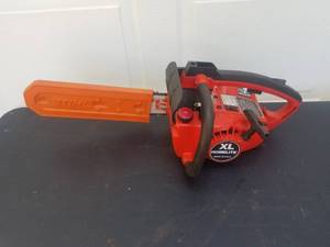 lot 497 image: Textron Homelite Chainsaw Model 10694