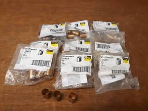 lot 301 image: Lot of (48) VIEGA 34 ProPress Bronze Stiffener Inserts - Part No. 16423