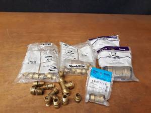 lot 302 image: Lot of SharkBite Brass Push Fit Fittings - 12 up to 1-12