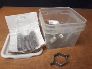 lot 395 image: Bucket Lot of 304 Stainless Steel Hex Pipe Hangers for 2.5 Pipe