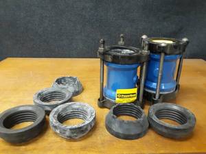 lot 409 image: Lot of (2) PowerSeal 3 Pipe Couplings w Gaskets - Model 3506