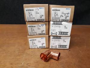 lot 335 image: Lot of (30) NIBCO 1-12 FTG x C Copper Pipe 90° Elbows