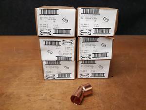 lot 336 image: Lot of (60) NIBCO 1-14 FTG x C Copper Pipe 45° Elbows