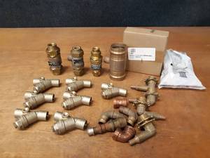 lot 446 image: Lot of 34 Brass Strainers, Backflow Valves and Other Assorted Copper and Brass Fittings