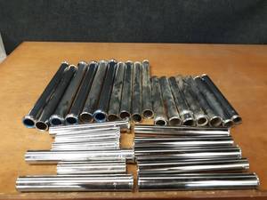 lot 499 image: Lot of (28) 1-12 Chrome Plated Brass Drain Tubes