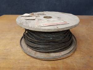 lot 512 image: Spool of 14 Steel Wire Cable - Spool is about 14 Diameter x 6 High Overall