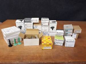 lot 524 image: Large Inventory of SLOAN and ZURN Parts