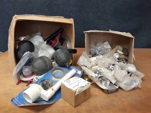 lot 526 image: Large Lot of Toilet Repair Parts and Faucet Repair Parts