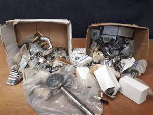 lot 527 image: Large Lot of Delta and Moen Faucet Handles and Repair Parts