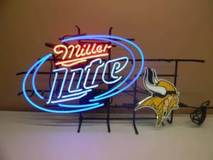 lot 2 image: MINNESOTA VIKINGS MILLER LITE NEON LIGHT - WORKS - NICE - SKOL - APPROX 35 BY 20 - SEE PICTURES