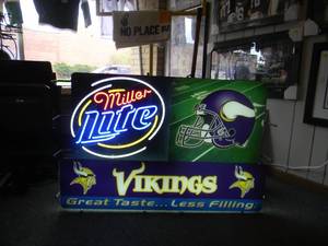 lot 3 image: MINNESOTA VIKINGS MILLER LITE NEON LIGHT - WORKS - NICE - SKOL - APPROX 43 BY 30 - SEE PICTURES