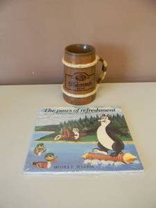 lot 65 image: 1960s HAMMS BEER ROPE HANDLE STEIN WITH THE STORY OF HAMMS BEER ADVERTISING BOOK (STILL WRAPPED) - NICE SET - SEE PICTURES