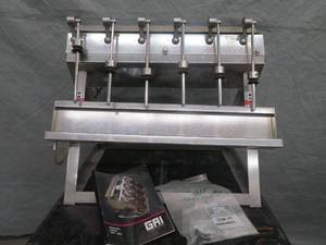 lot 15 image: STAINLESS STEEL BOTTLER  FILLER