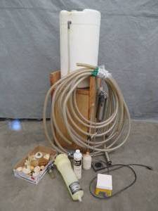 lot 19 image: PLASTIC BARRAL FOR WINE MAKING AND CLEANING MATERIALS WITH PUMP