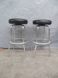 lot 22 image: TWO SPINNING BAR STOOLS