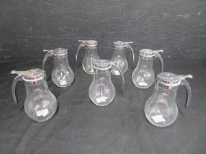 lot 33 image: 7 -14OZ SYRUP DESPENSERS