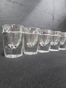 lot 44 image: 5 THICK GLASS SHOT GLASSES