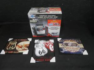 lot 72 image: NEW IN BOX- COMPACT BATTERY JUMP STARTER 300- AND 3 AUTO RELATED WALL ART