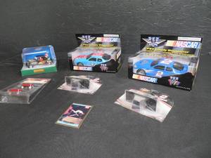 lot 90 image: MISC COLLECTABLE NASCAR CARS- LEMAX WAGONS AND CAR- AND NOLAN RYAN BASEBALL CARD