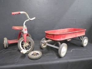 lot 94 image: VINTAGEANTIQUE JUNIOR TRICYCLE AND RED WAGON  EXTRA TIRE