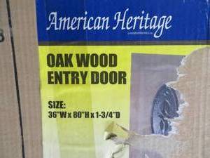 lot 97 image: AMERICAN HERITAGE SOLID OAK DOOR WITH BEAUTIFUL GLASS WINDOW
