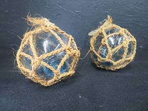 lot 106 image: 2 HANDBLOWN GLASS JAPANESE BOATSFLOATS WITH TWINE AROUND THEM