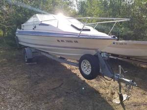 lot 503 image: Bayliner 188 Cruiser Boat, Force 125 Outboard Motor, Escort Boat Trailer