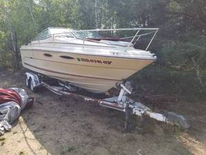 lot 504 image: Sea Ray 21 Cruiser Boat, Mercury MerCruiser Inboard Motor, EZ Loader Dual Axle Boat Trailer