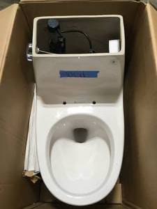 1-Piece 1.28 GPF High Efficiency Single Flush Round Front Toilet in White, Seat Included by Glacier Bay