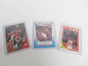lot 44 image: 3 Assorted Michael Jordan Basketball Cards
