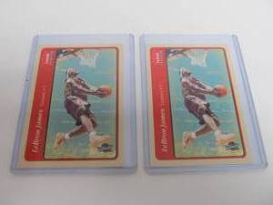 lot 50 image: Pair of Lebron James 2004-05 Fleer Tradition #140