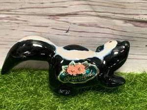 lot 9 image: Vintage Rosemeade Pottery Skunk Shaker