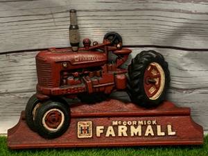 lot 87 image: Cast Iron Mccormick Farmall Doorstop 9 Wide