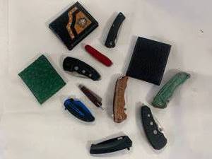 lot 90 image: Nine Knives & Three Wallets