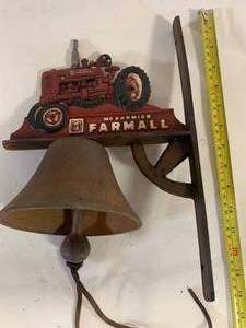 lot 105 image: Cast Iron Farmall Bell