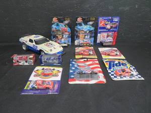 lot 68 image: LOT OF 10 COLLECTABLE TOY RACE CARS AND 1 BIGGER MODEL RACE CAR