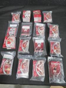 lot 99 image: 16 DECKS OF COLLECTABLE FOOTBALL AND BASKETBALL CARDS