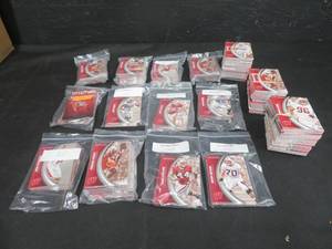 lot 100 image: 16 DECKS OF COLLECTABLE FOOTBALL AND BASKETBALL CARDS