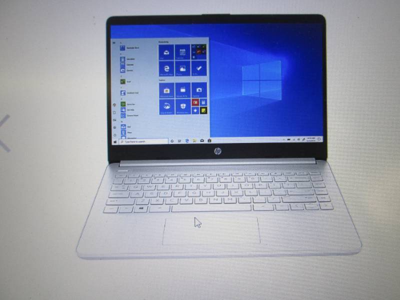 lot 64 image: HP 14 HD AMD Athlon Silver 4GB Mem...