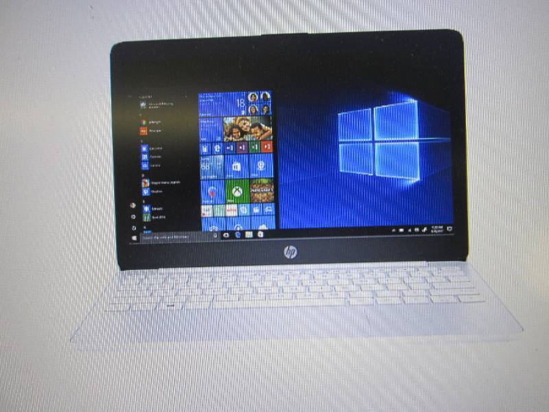 lot 65 image: HP 11.6 HD Intel Celeron 4GB Memor...