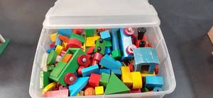 lot 42 image: Plastic Storage Box Full of Wood Tr...