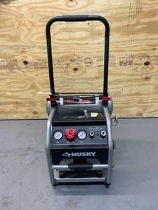 lot 73 image: HUSKY 4.5 Gal. Portable Electric-Powered Silent Air Compressor