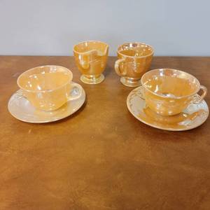 lot 35 image: Vintage Fire King by Anchor Hocking Peach Luster Tea Set-Service For Two