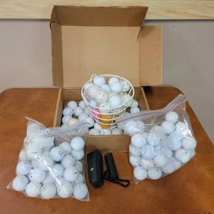 lot 43 image: Golf Balls and Golf Scope