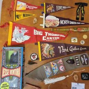 lot 57 image: Vintage Pennants, Girls Scout Sash with patches, Jesse Ventura doll