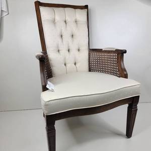 lot 04 image: Vintage Upholstered Chair with Cane Backed Arm Rests