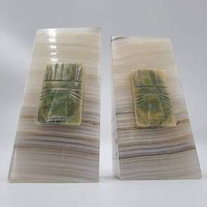 lot 23 image: Pair of Vintage Carved White Onyx and Jade Aztec Mayan Tiki Bookends