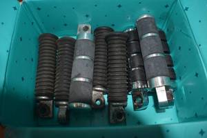 Motor cycle pegs