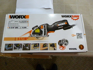 lot 9 image: NEW Worx Mini Circular Saw with Laser Guide Technology